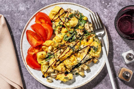 Gratin crémeux de tortelloni aux champignons