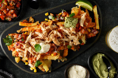 Cheesy loaded fries met pulled chicken