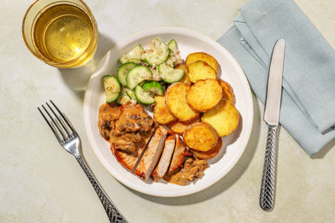 Varkensoester in romige kalf-champignonsaus