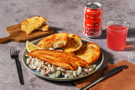 Harissa-Fischfilet mit knusprigem Knoblauchbrot