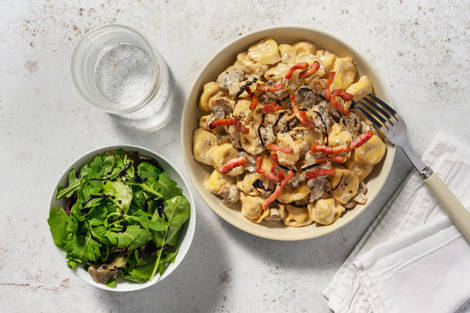 Cured Ham Tortelloni in Creamy Mushroom and Bacon Sauce