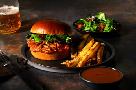 Birria Style Pulled Beef and Crispy Bacon Burger 