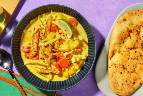 Goldenes Curry mit Spitzkohl und extra Hähnchen