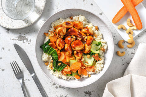 Aiguillettes de poulet en sauce sucrée et riz à l’ail
