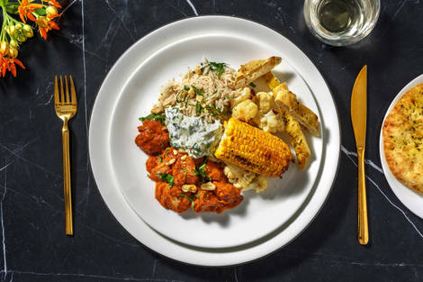 Butter chicken met rijst en zelfgemaakte raita