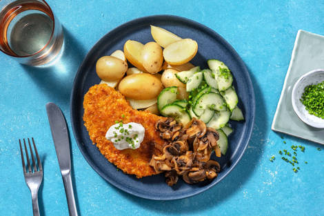 Vegetarische schnitzel met champignonroomsaus