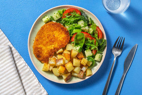 Vegetarische kaasschnitzel met gebakken aardappeltjes