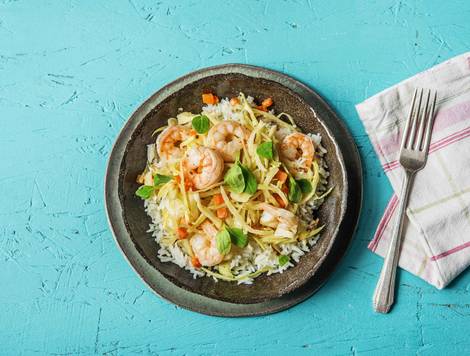 Groene garnalencurry met pandanrijst, romige kokosmelk en shiso cress