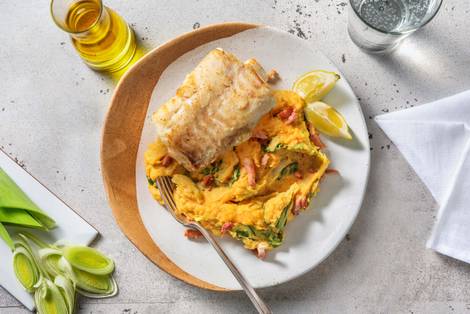 Kabeljauw met zoete-aardappelpuree en spekjes