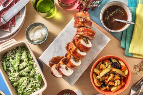 Kalkoenrollade met serranoham en uien-rozemarijnjus