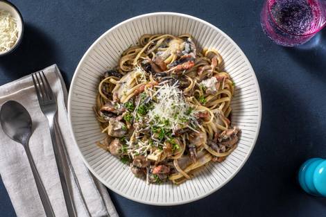 Linguine met champignonroomsaus en spekjes