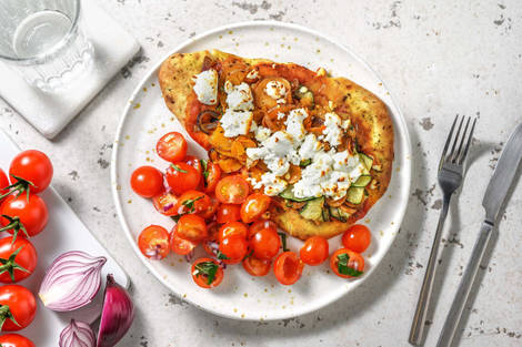 Pizza sur naan au chèvre et aux légumes