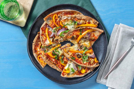 Platbroodpizza's met champignons en mozzarella