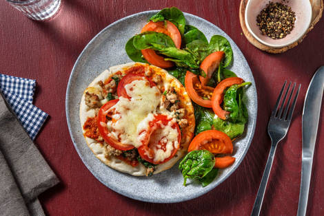 Toast de focaccia au poulet haché et fromage gratiné