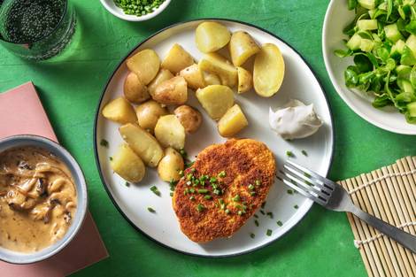 Vegetarische schnitzel met champignonroomsaus