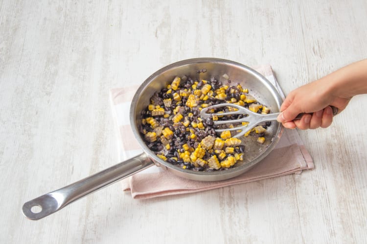 cook the onion, corn, and black beans