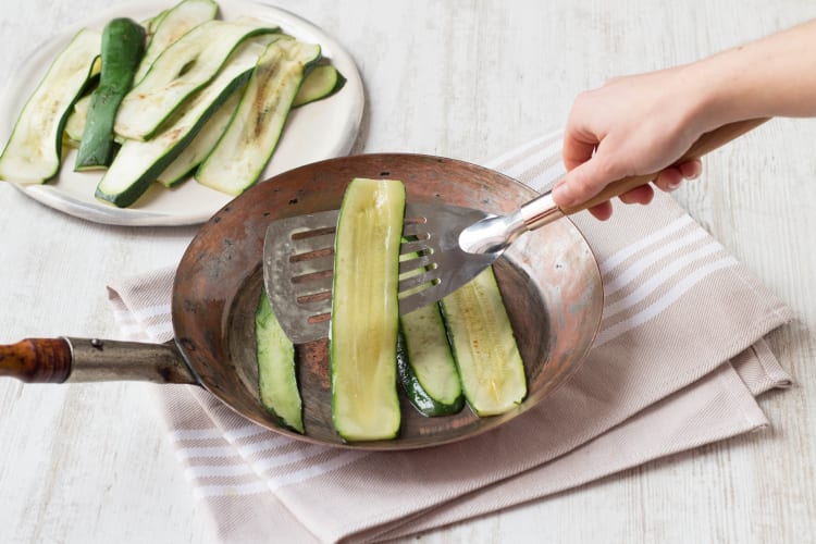 Fry courgette strips until slightly brown