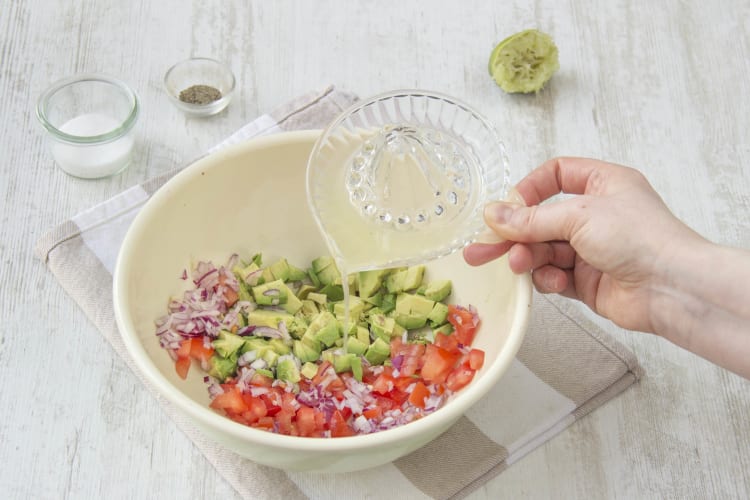 Combine avocado, tomato and onions in a bowl