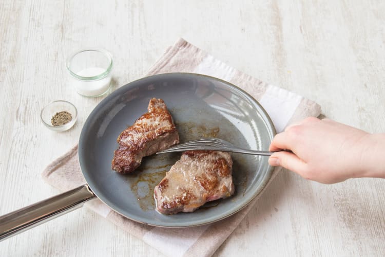 Sear the steak until golden brown