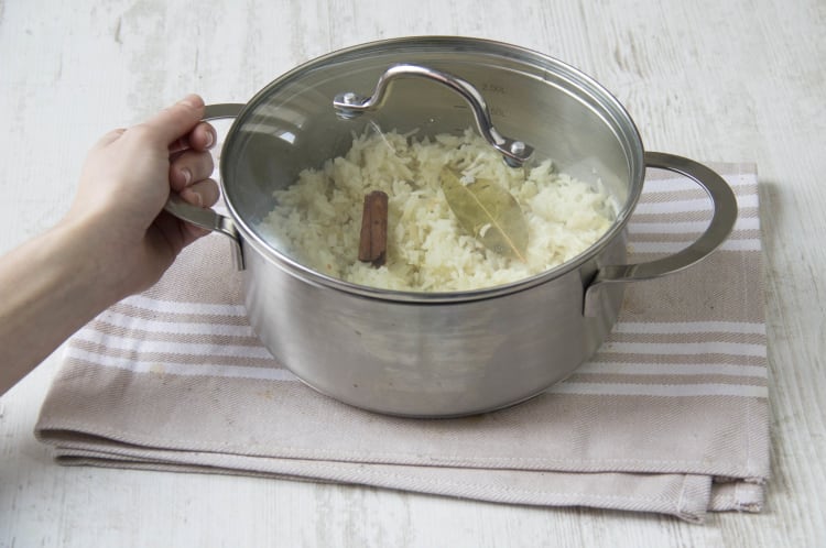 Cook rice with cinnamon and bay leaf