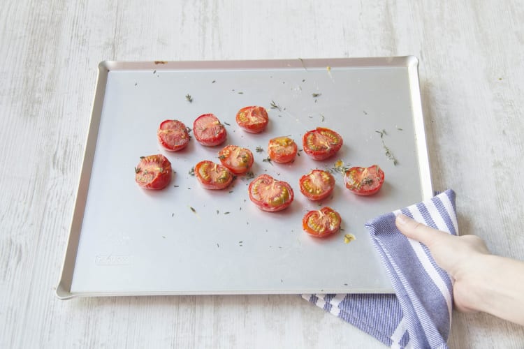 Place the tomatoes on the baking tray