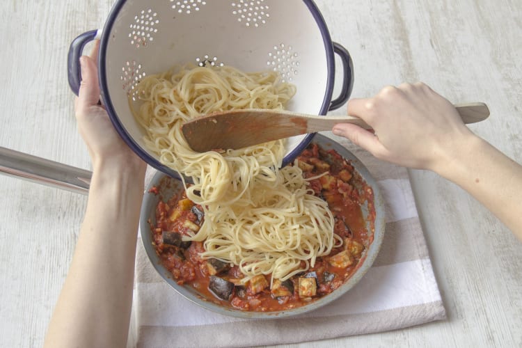 Toss the pasta in the pan with the sauce