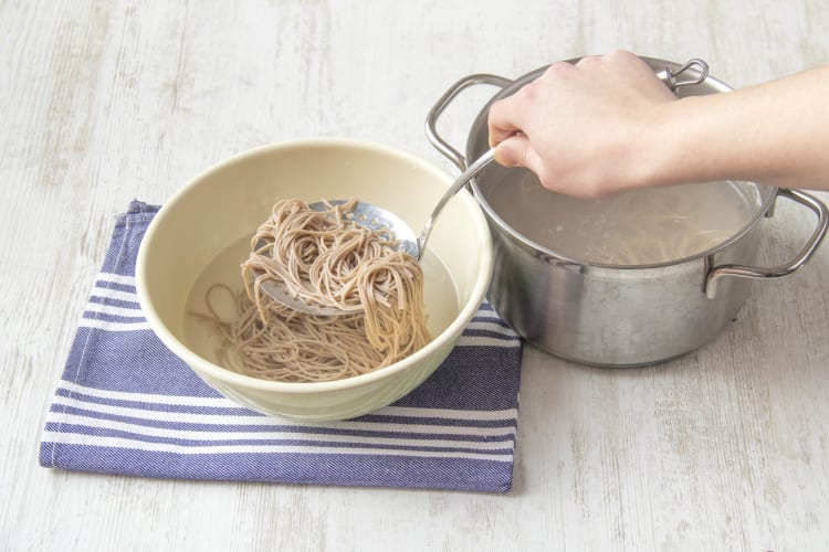 Add soba noodles to boiling water