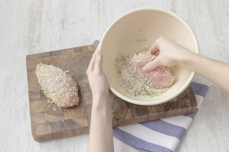 Coat chicken breast in breadcrumbs