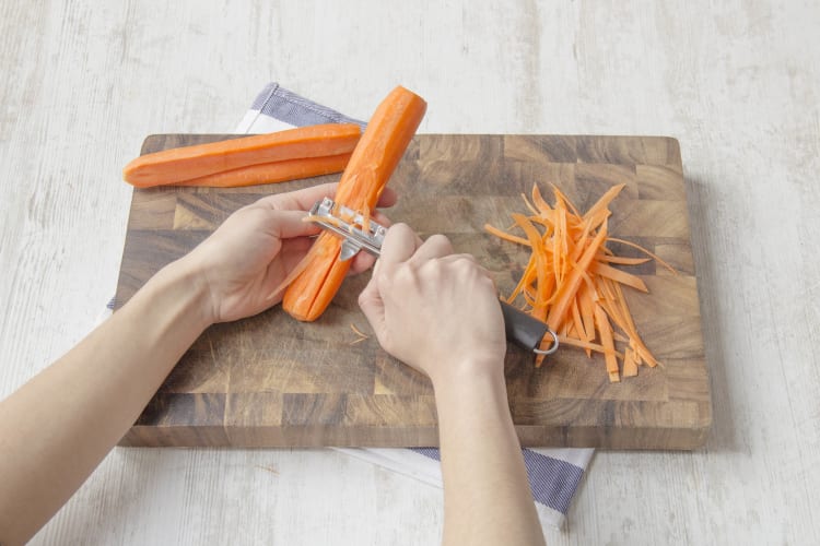 Finely shave carrots