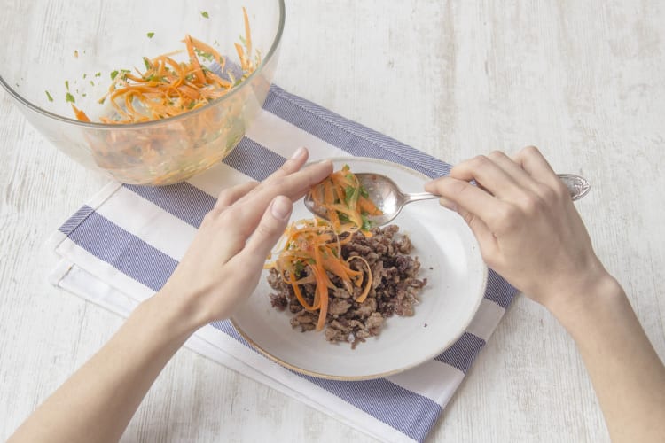 Serve spiced lamb with carrot salad and pappadums