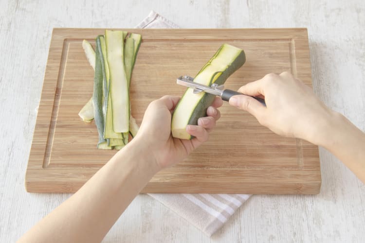 Shave zucchini into ribbons
