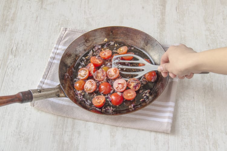 Chop and fry cherry tomatoes