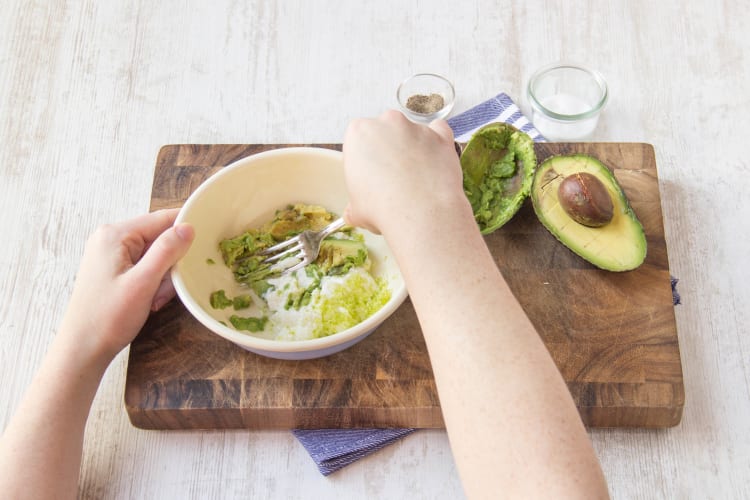 Mash the avocado with a fork then add the sour cream and 1 tsp of lime juice