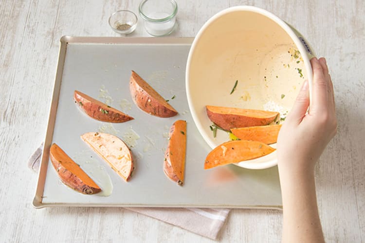 Place the potatoes on the baking tray