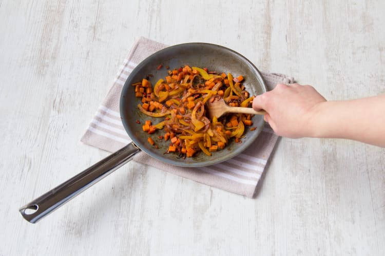 Add the carrot and pepper