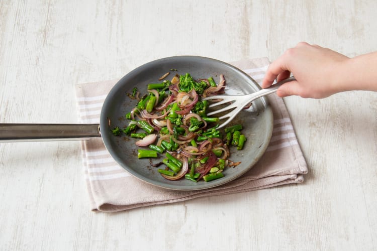 Cook red onion and broccoli