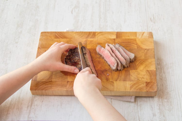 Thinly slice the steak