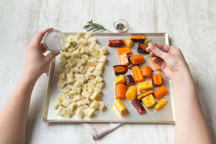 Arrange the croutons and carrots on a baking sheet
