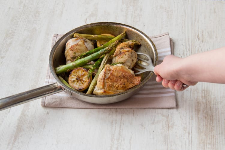 Add asparagus, olives and garlic to the pan