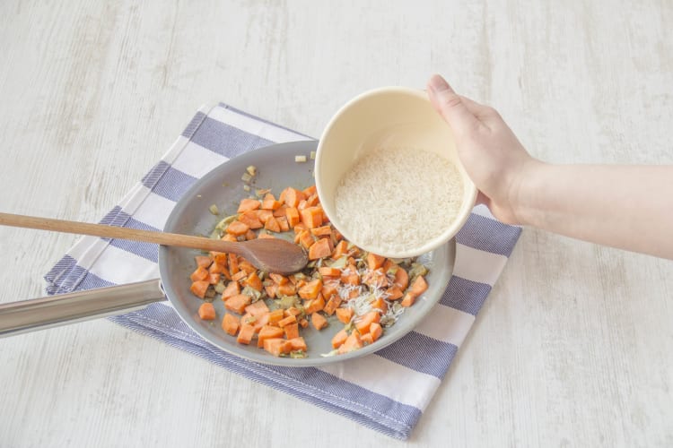 Add the rice to the carrot mix