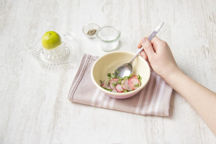 Mix the radishes and cilantro and top with lime