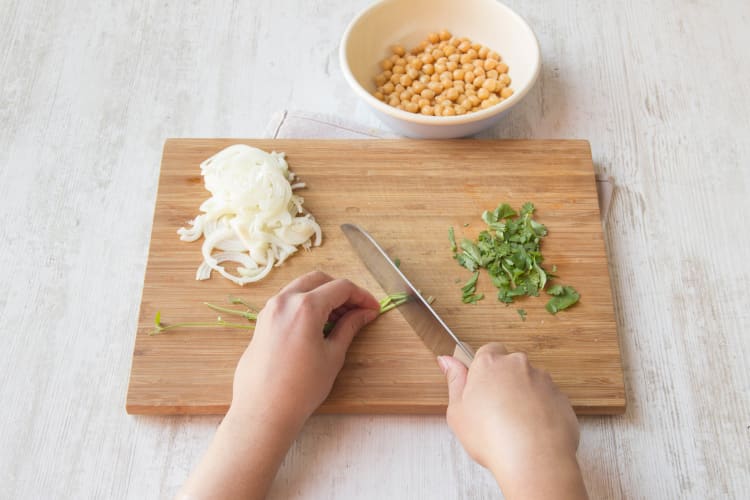 Roughly chop coriander