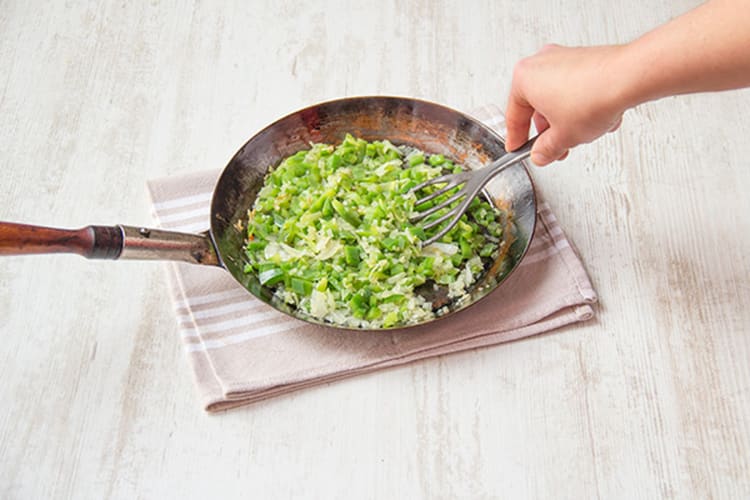 Sauté bell pepper and garlic in a pan