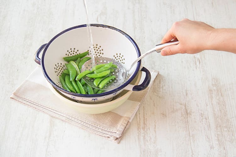 Cook and drain the snap peas