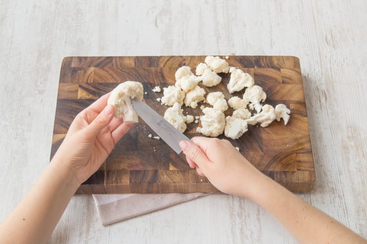 Cut the cauliflower into florets
