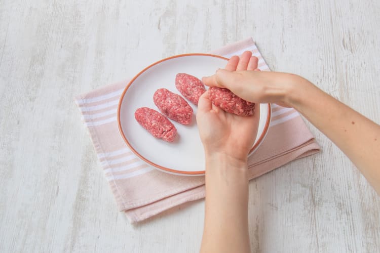 Roll the lamb kofta mince into 8 cm long sausages and place on a plate