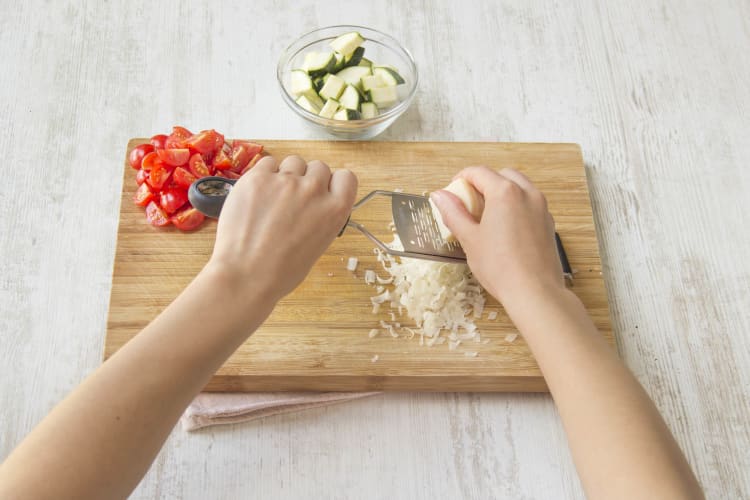 Chop cherry tomatoes and courgette