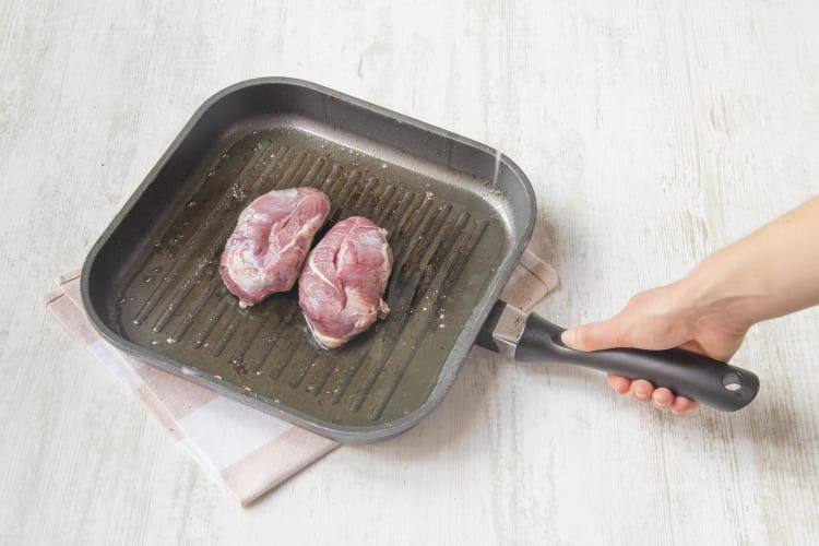 Cook the duck skin side down in a pan