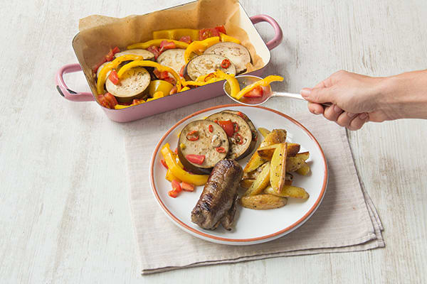 Serveer de runderrolletjes met de aardappelen en de groente.