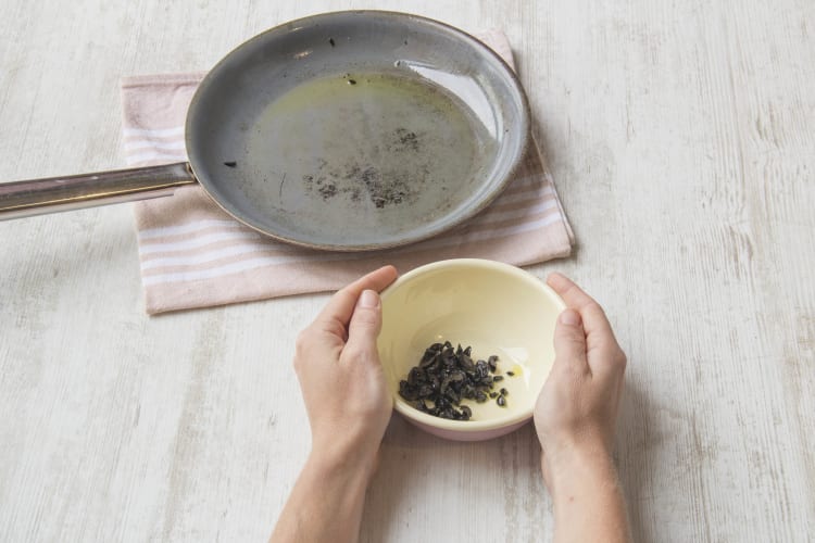 Cook the olives and remove from the pan